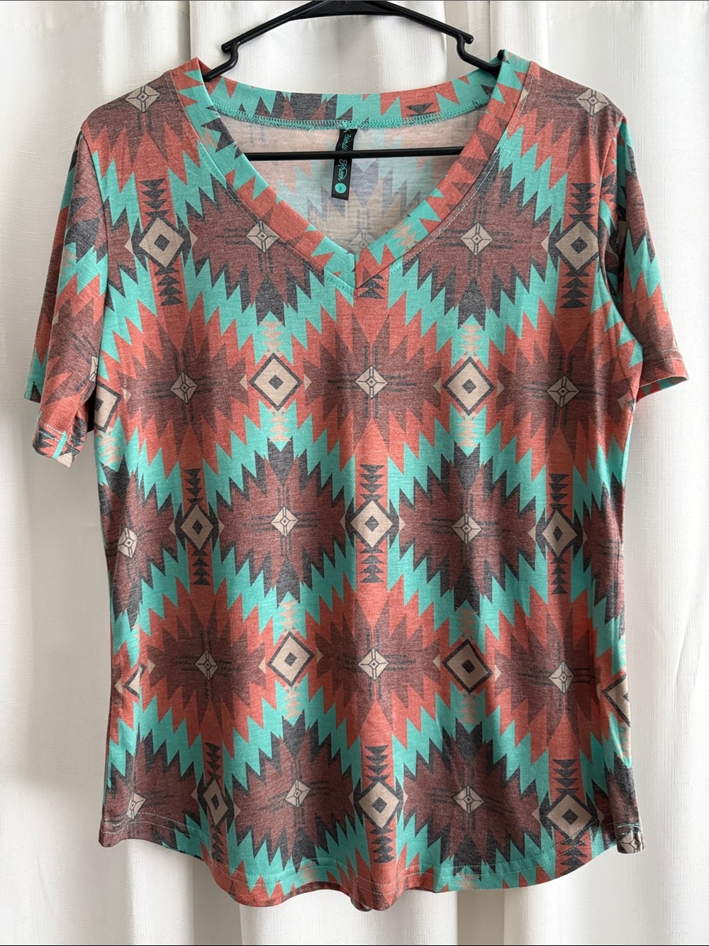 Sterling Kreek Women’s V-Neck Aztec Tee in Turquoise and Rust